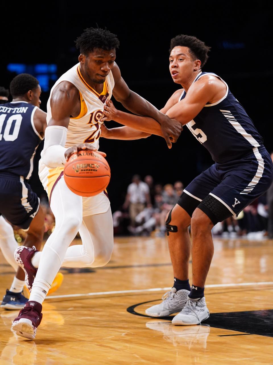 Iona's Nelly Junior Joseph attempts to drive inside during the Gaels' 91-77 win over Yale at the Barclays Center on Sunday, Dec. 12, 2021.