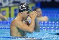 Michael Andrew reacts after winning the Men's 100 Breaststroke during wave 2 of the U.S. Olympic Swim Trials on Monday, June 14, 2021, in Omaha, Neb. (AP Photo/Jeff Roberson)