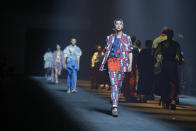 A model wears a creation for the Kenzo mens Spring-Summer 2020 fashion collection presented in Paris, Sunday, June 23 2019. (AP Photo/Michel Euler)