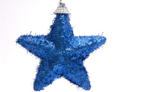 Festive blue tinsel sparkly star tree decoration