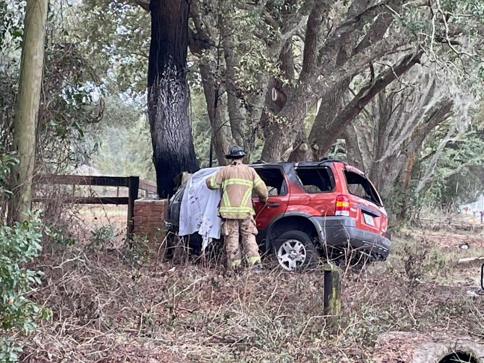 A Marion County Fire Rescue firefighter at the scene of a traffic death Thursday morning.