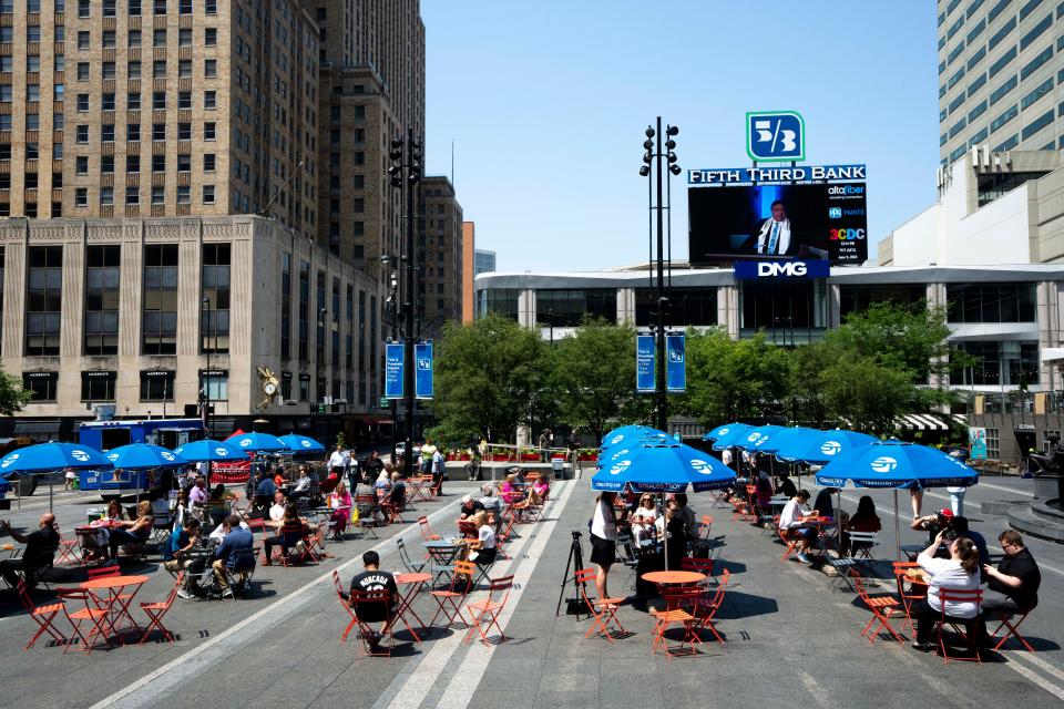 A memorial service for Jerry Springer, former Cincinnati mayor, is played on the screen at Fountain Square in Cincinnati on Friday