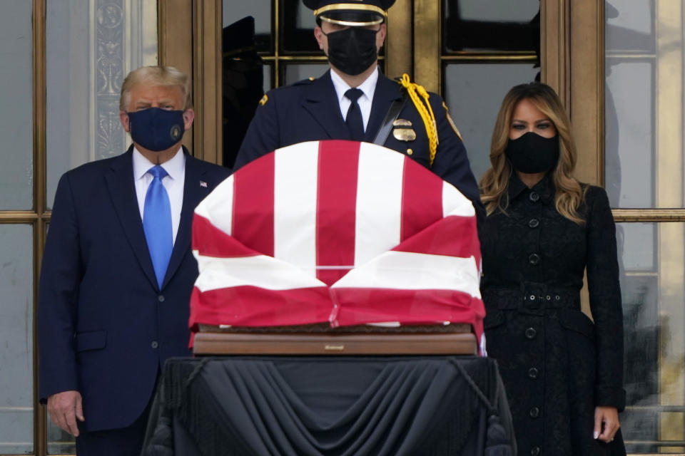 President Donald Trump and first lady Melania Trump pay respects as Justice Ruth Bader Ginsburg lies in repose at the Supreme Court building on Thursday, Sept. 24, 2020, in Washington. Ginsburg, 87, died of cancer on Sept. 18. (AP Photo/J. Scott Applewhite)