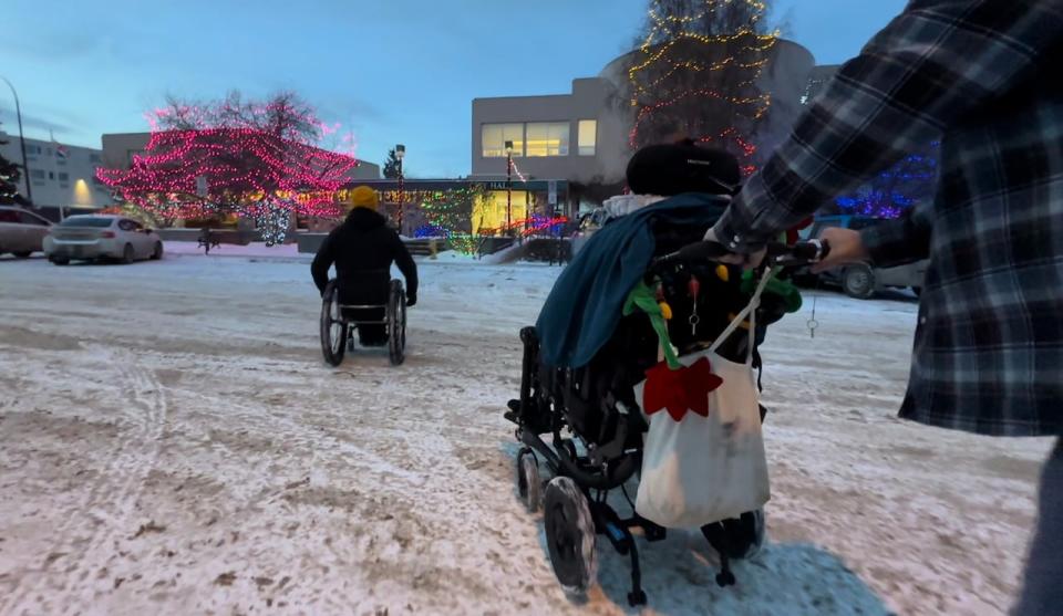 Accessibility advocates head to Whitehorse city hall, November 2023.