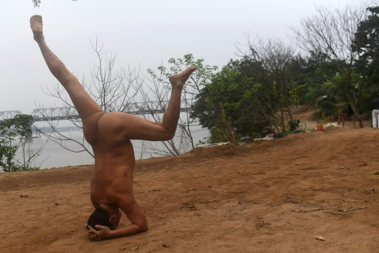 The men meet to shed their clothes, and modesty, for a cheeky dip, a game of chess, or yoga headstands in the buff -- which they believe comes with health benefits