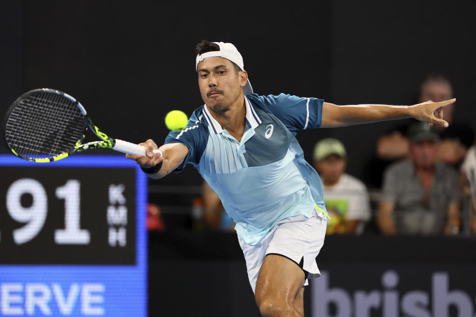 Jason Kubler of Australia plays a shot in his match against Rafael Nadal of Spain during the Brisbane International tennis tournament in Brisbane, Australia, Thursday, Jan. 4, 2024. (AP Photo/Tertius Pickard)