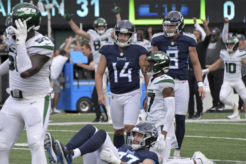 Tennessee Titans kicker Randy Bullock (14) reacts after missing a field goal and giving the win to the New York Jets during overtime of an NFL football game, Sunday, Oct. 3, 2021, in East Rutherford, N.J. (AP Photo/Bill Kostroun)