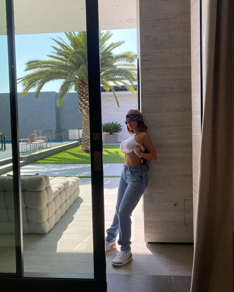 <p>The <em>Keeping Up With the Kardashians</em> star kicked back in jeans and sneakers for a <a href="https://www.instagram.com/p/CFunyaInWuV/" rel="nofollow noopener" target="_blank" data-ylk="slk:little photo shoot;elm:context_link;itc:0;sec:content-canvas" class="link ">little photo shoot</a> in her Holmby Hills home. PEOPLE confirmed that the 22-year-old beauty mogul <a href="https://people.com/home/kylie-jenner-buys-36-million-estate-exclusive-los-angeles-neighborhood-holmby-hills/" rel="nofollow noopener" target="_blank" data-ylk="slk:purchased the new $36.5 million estate;elm:context_link;itc:0;sec:content-canvas" class="link ">purchased the new $36.5 million estate</a> in the exclusive Los Angeles neighborhood in April. </p>
