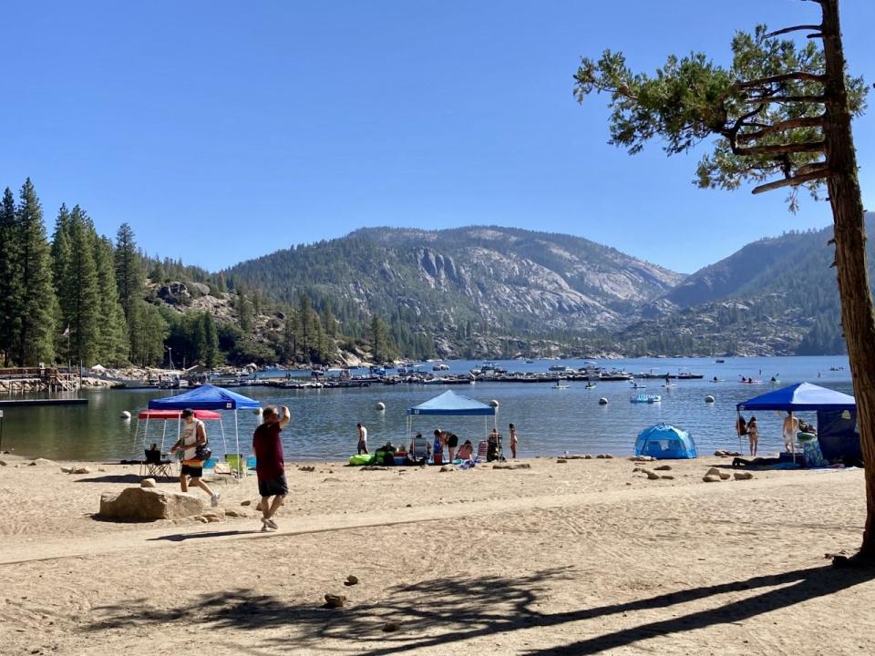 Pinecrest Lake welcomes both swimmers and fisherman.