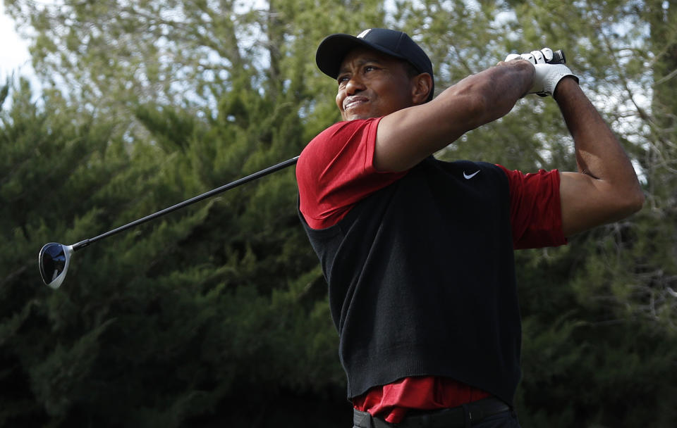 Tiger Woods hits off the second tee during a golf match against Phil Mickelson at Shadow Creek golf course, Friday, Nov. 23, 2018, in Las Vegas. (AP Photo/John Locher)