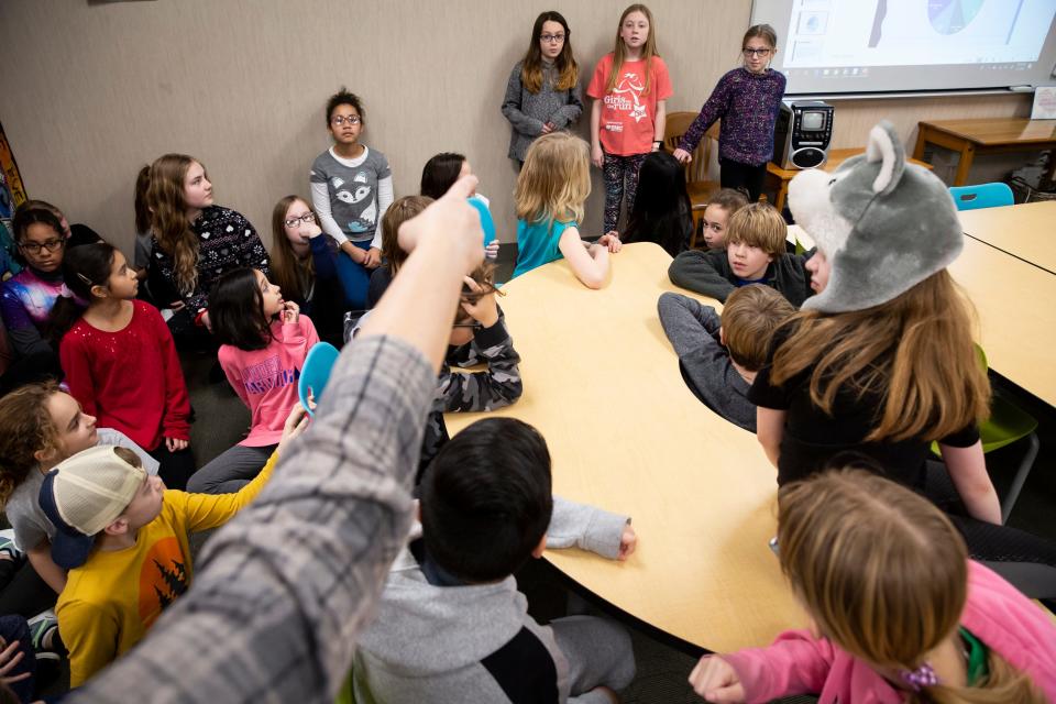 Teachers try and count students aligning with ice cream during the first alignment as Fourth and Fifth grade students at the DMPS Downtown School participate in a cookie caucus on Monday, Feb. 3, 2020, in Des Moines. Ice cream came out on top with 66% of the vote and Pie the next closest at 31%.