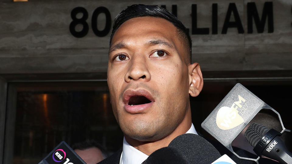 Israel Folau is seen here speaking at a press conference outside court.