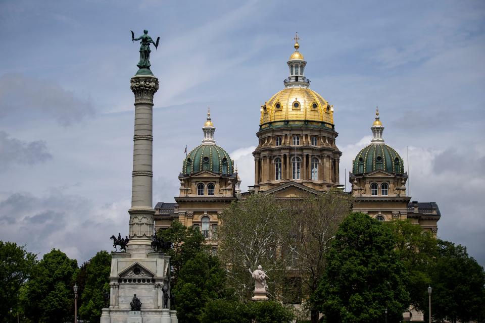 Sunlight shines on the gold dome of the Iowa State Capitol in 2021.