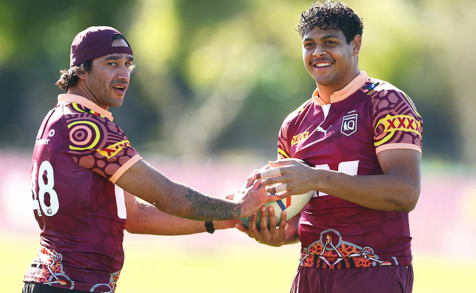 Selwyn Cobbo with Maroons assistant coach Johnathan Thurston at training.