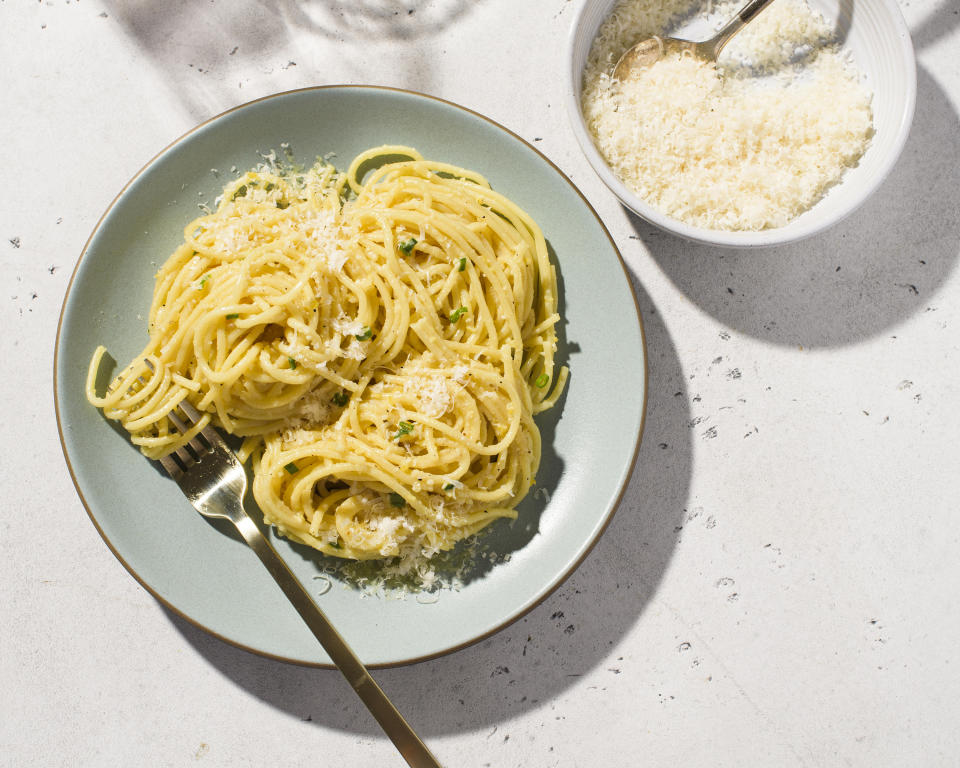 This image released by Milk Street shows a recipe for spaghetti with lemon pesto, from the cookbook “Milk Street 365: The All-Purpose Cookbook for Every Day of the Year.” (Milk Street via AP)