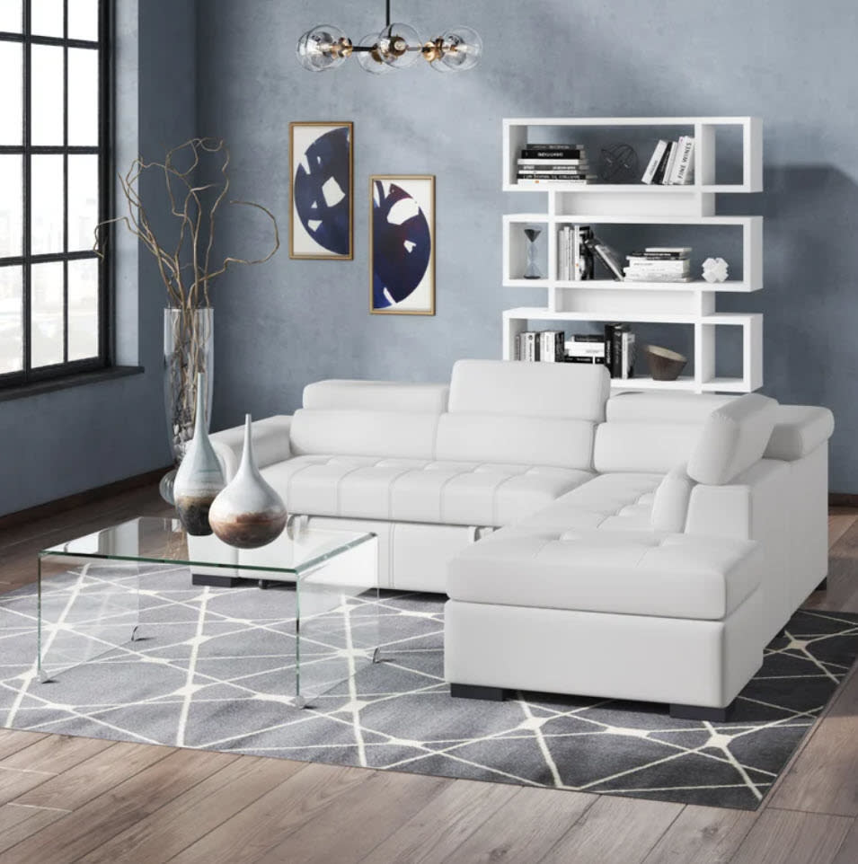 large sectional crisp white couch in modern living space