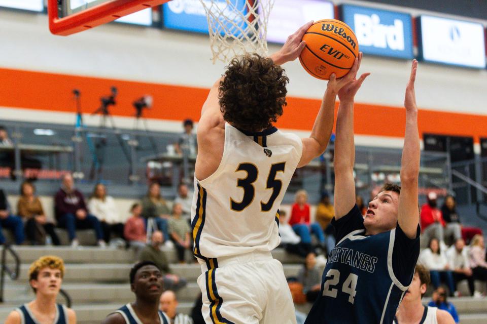 Copper Hills High School plays Crimson Cliffs High School during a boys basketball semifinal game of the Allstate Falcon Classic at Skyridge High School in Lehi on Friday, Dec. 8, 2023. | Megan Nielsen, Deseret News