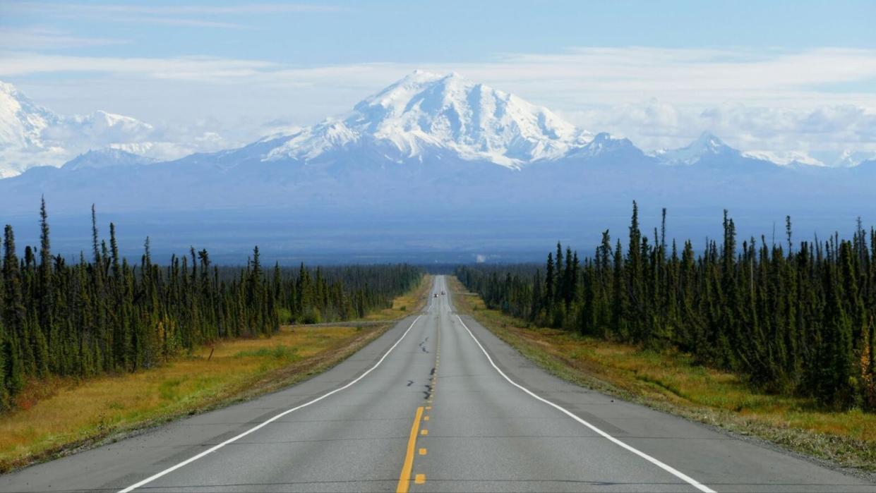 The open road of Alaska during the warm season.