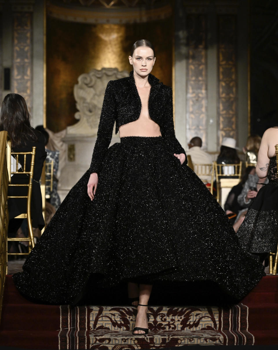 A model walks the runway during the Christian Siriano Fall/Winter 2024 fashion show at The Plaza Hotel during New York Fashion Week on Thursday, Feb. 8, 2024, in New York. (Photo by Evan Agostini/Invision/AP)