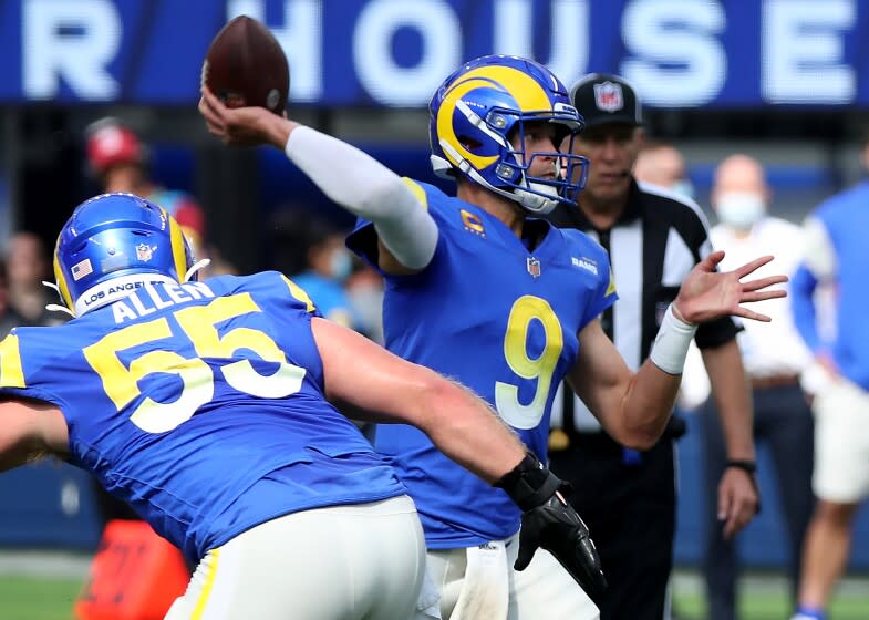 INGLEWOOD, CALIF. - OCT. 24, 2021. Rams quarterback Matthew Stafford throws a pass against the Lions during a game at SoFi Stadium in Inglewood on S\unday, Oct. 24, 2021. (Luis Sinco / Los Angeles Times)