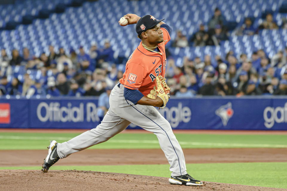 Houston Astros starting pitcher Framber Valdez throws during the first inning of a baseball game against the Toronto Blue Jays in Toronto, Sunday, May 1, 2022. (Christopher Katsarov/The Canadian Press via AP)