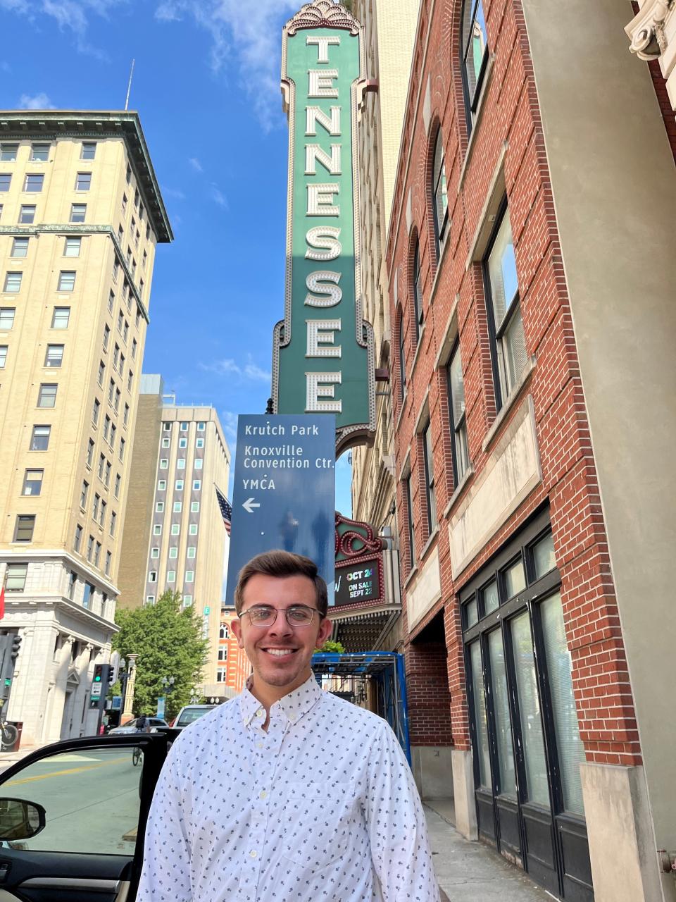 Matthew Fisher, the associate house organist for the Tennessee Theatre, stands outside the Gay Street theater.