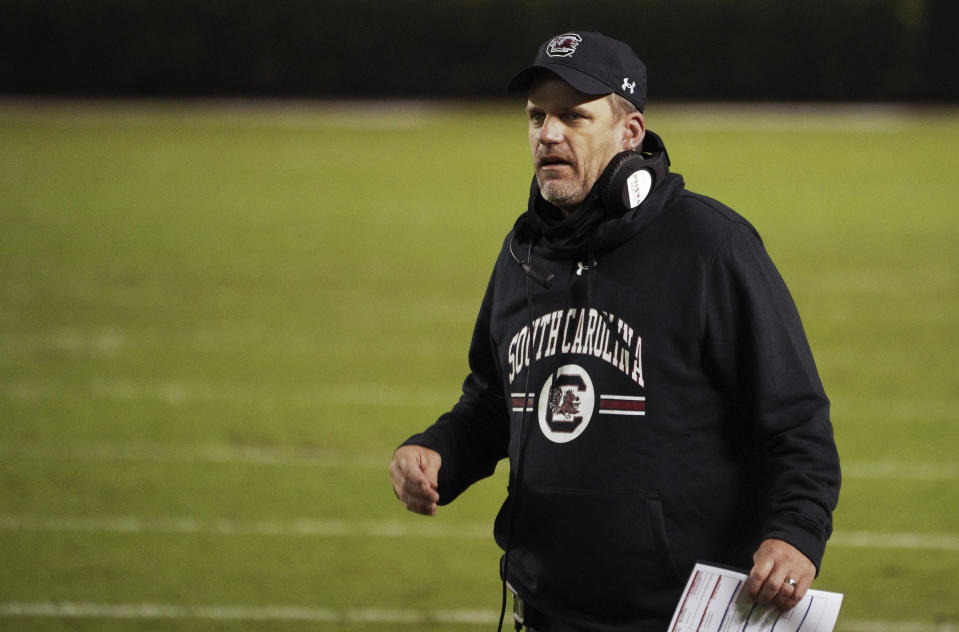 FILE - South Carolina interim head coach Mike Bobo walks down the sideline during the second half of an NCAA college football game against Missouri, Saturday, Nov. 21, 2020, in Columbia, S.C. Bobo was named offensive coordinator at Georgia in February 2023. Bobo, a former Bulldogs quarterback and longtime assistant coach at his alma mater, also served as offensive coordinator under former coach Mark Richt. (AP Photo/Sean Rayford, File)