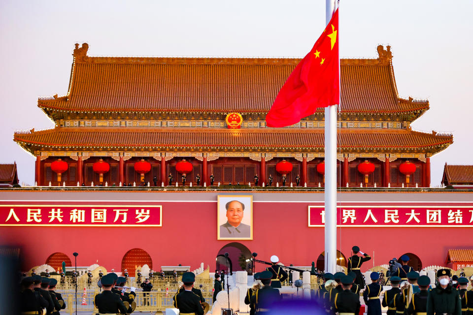 The Guard of Honor of the Chinese People's Liberation Army  performs a flag-raising ceremony at the Tian'anmen Square on Jan. 1, 2023 in Beijing, (VCG via Getty Images)