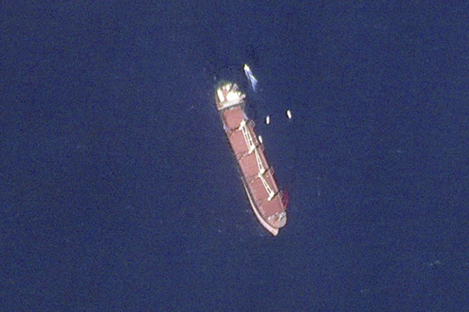 This satellite image taken by Planet Labs PBC shows the Belize-flagged ship Rubymar in the Red Sea on Wednesday, Feb. 28, 2024. The Rubymar, earlier attacked by Yemen's Houthi rebels, has sunk in the Red Sea after days of taking on water, officials said Saturday, March 2, 2024, the first vessel to be fully destroyed as part of their campaign over Israel's war against Hamas in the Gaza Strip. (Planet Labs PBC via AP)