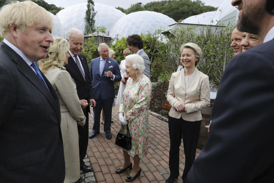 FILE - Britain's Queen Elizabeth II speaks to U.S. President Joe Biden and his wife Jill Biden during a reception with the G7 leaders at the Eden Project in Cornwall, England, June 11, 2021, during the G7 summit. Queen Elizabeth II, Britain's longest-reigning monarch and a rock of stability across much of a turbulent century, died Thursday, Sept. 8, 2022, after 70 years on the throne. She was 96. (Jack Hill/Pool via AP, File)