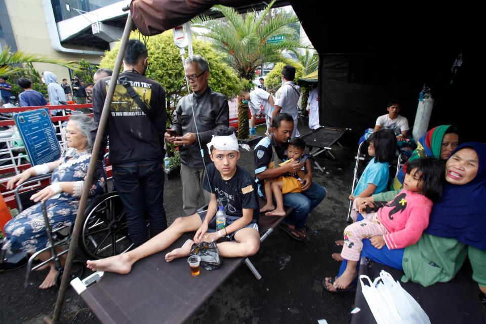 Au moins 162 personnes sont mortes suite à un séisme sur l'île de Java ce lundi en Indonésie. Des centaines d'autres ont été blessées. - STR / AFP