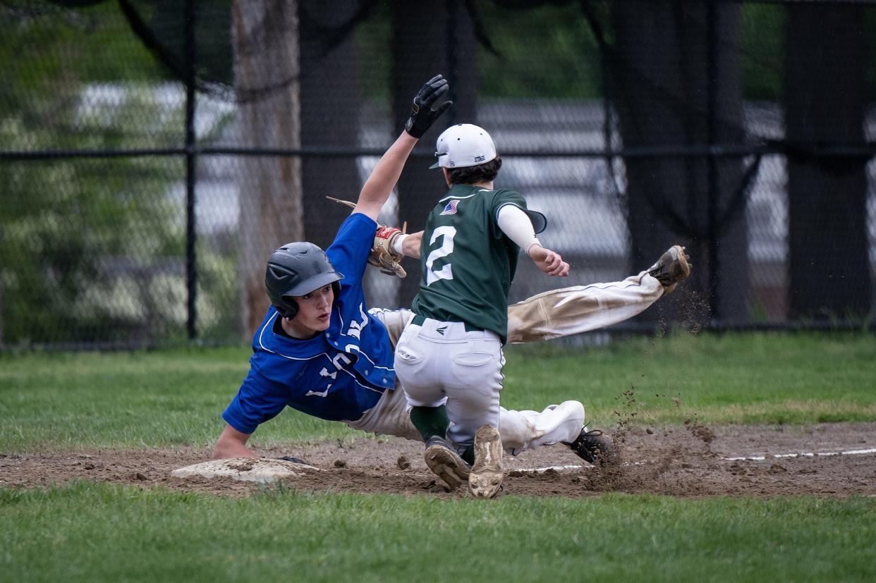 Tahanto's Luke Stevens tags out West Boylston's Tommy Kursonis.