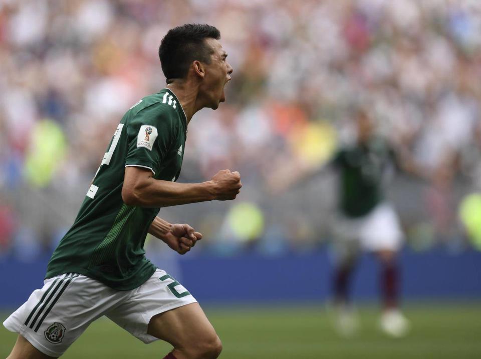 Lozano wheels away in delight (Getty)