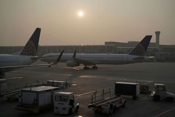 PHOTO: A plane taxis to the runway as smoke from wildfires in Canada reduces visibility, June 28, 2023, at O'Hare International Airport in Chicago. (Joshua A. Bickel/AP)