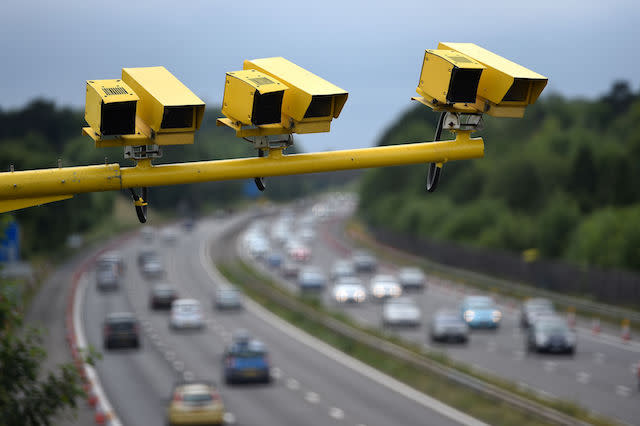 General view of three SPECS Average Speed cameras in position on the M3 motorway in Hampshire