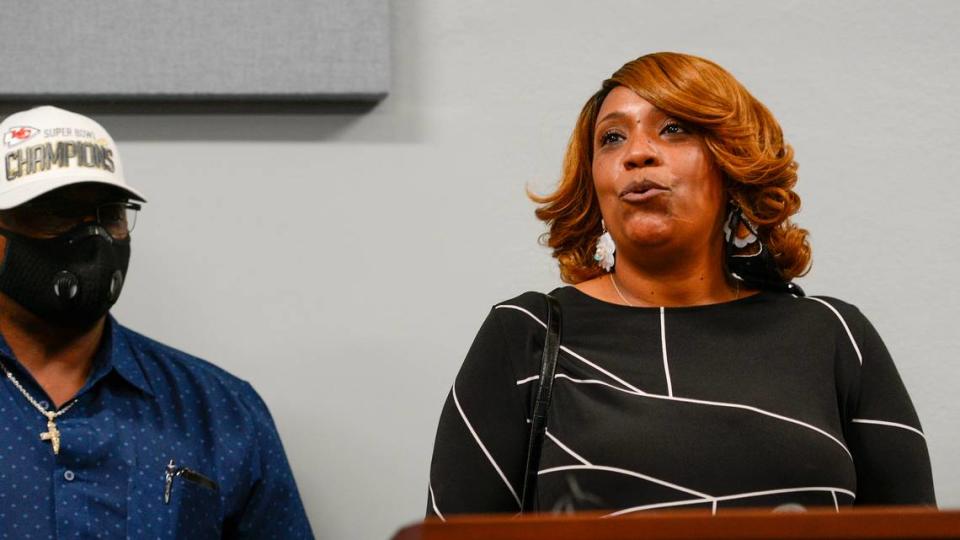 Laurie Bey, the mother of Cameron Lamb, speaks to reporters Thursday after prosecutors announced charges against the officer who fatally shot Lamb in December.