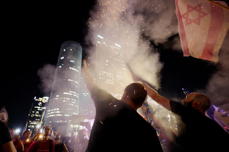 Protesters demonstrate against Israeli PM Netanyahu and his nationalist coalition government's judicial overhaul, in Tel Aviv