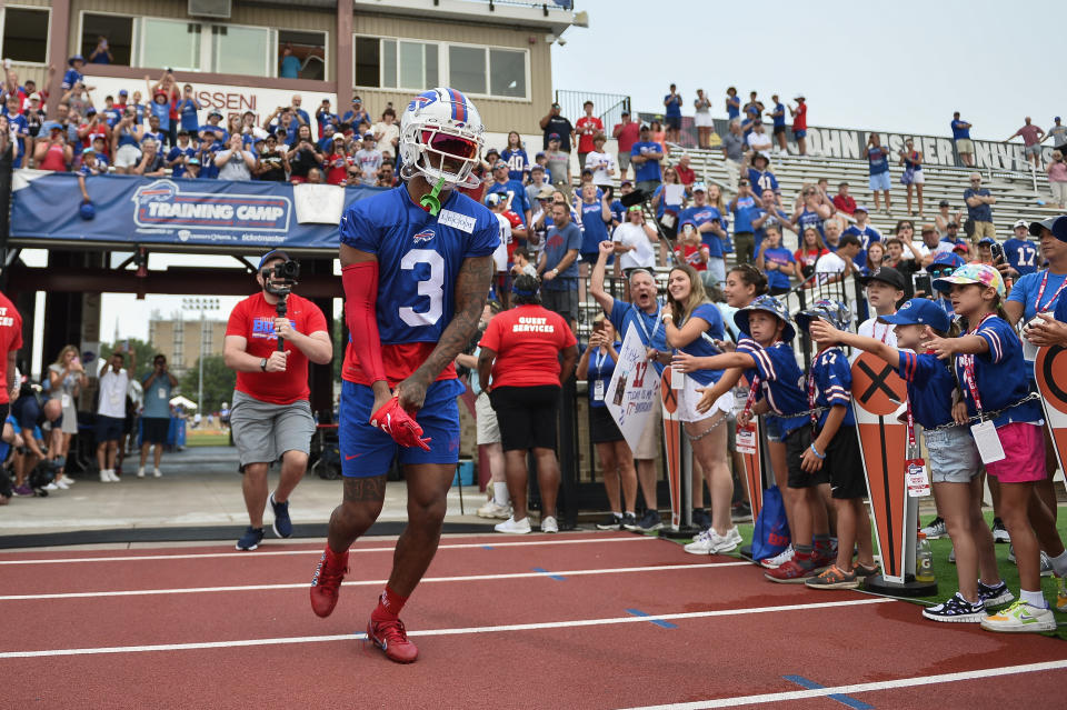 FILE - Buffalo Bills safety Damar Hamlin (3) runs to the field before practice at the NFL football team's training camp in Pittsford, N.Y., July 26, 2023. Hamlin is preparing for the next step to resume his career by suiting up in Buffalo's preseason-opening game against the Indianapolis Colts on Saturday, Aug. 12, 2023. (AP Photo/Adrian Kraus, File)