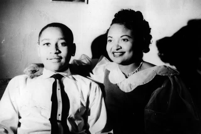 <p>Chicago Tribune file photo/Tribune News Service via Getty Images</p> Emmett Louis Till, 14, with his mother, Mamie Till-Mobley, at home in Chicago in 1954