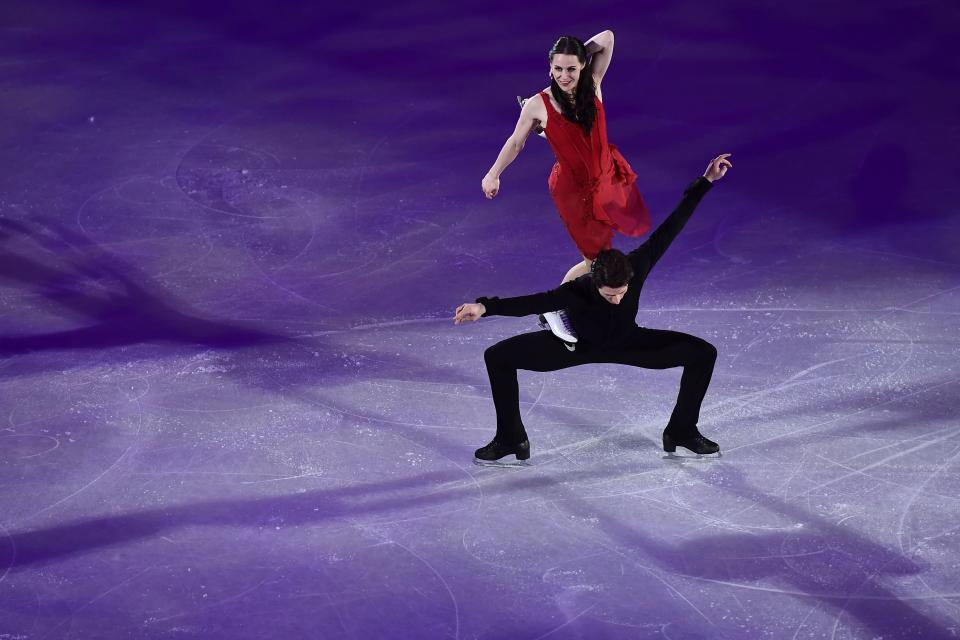 <p>Canada’s Scott Moir and Canada’s Tessa Virtue perform during the figure skating gala event during the Pyeongchang 2018 Winter Olympic Games at the Gangneung Oval in Gangneung on February 25, 2018. / AFP PHOTO / ARIS MESSINIS (Photo credit should read ARIS MESSINIS/AFP/Getty Images) </p>