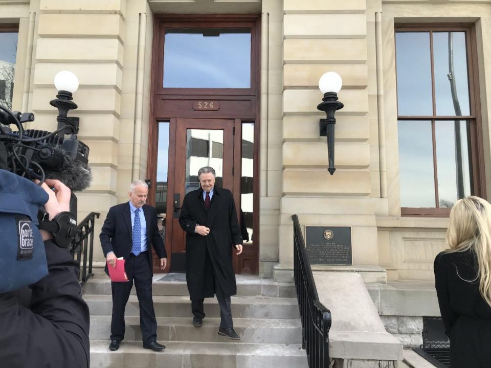 Former Macomb County Public Works Director Anthony Marrocco leaves the federal courthouse in Port Huron after being sentenced Thursday, March 16, to three years in prison and two years of supervised release in a corruption probe.
