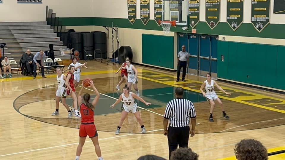 Bedford's Payton Pudlowski (13) looks for a pass during a game against Flat Rock on Thursday, January 5, 2023.