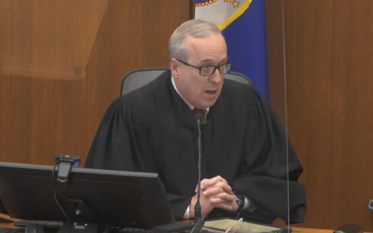 In this image from video, Hennepin County Judge Peter Cahill speaks  during the Derek Chauvin trial.