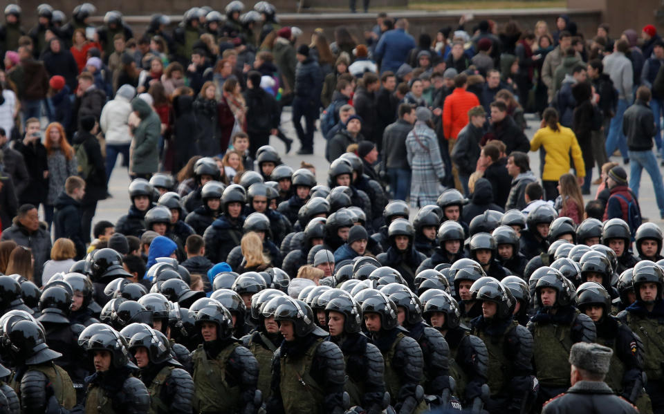 Law enforcement officers gather to&nbsp;block opposition supporters in Moscow.