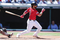 Cleveland Guardians catcher Austin Hedges watches his two RBI single off Detroit Tigers pitcher Reese Olson during the second inning of a baseball game, Wednesday, May 8, 2024, in Cleveland. (AP Photo/Ron Schwane)