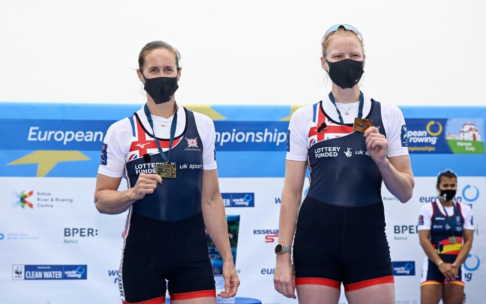 Helen Glover and Polly Swann celebrate on the podium. - GETTY IMAGES