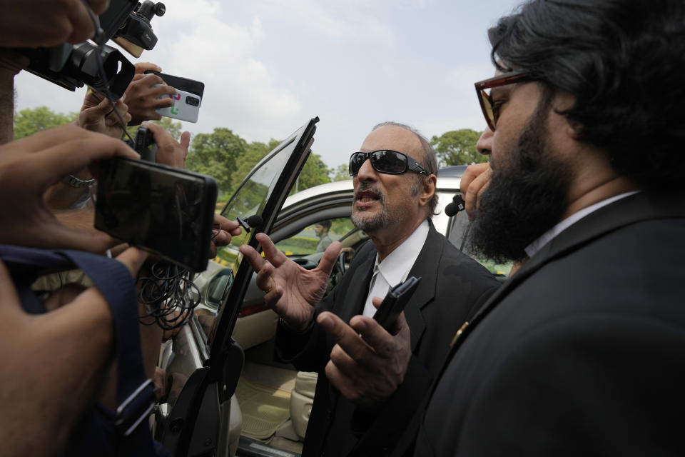 Babar Awan, a leading lawyer of imprisoned former Prime Minister Imran Khan's legal team, talks to media as he leaves the Islamabad High Court in Islamabad, Pakistan, Thursday, Aug. 24, 2023. A court in Pakistan's capital is likely to issue a crucial ruling Thursday on an appeal from the country's imprisoned former Prime Minister Khan against his recent conviction and three-year sentence in a graft case, one of his lawyers said. (AP Photo/Anjum Naveed)