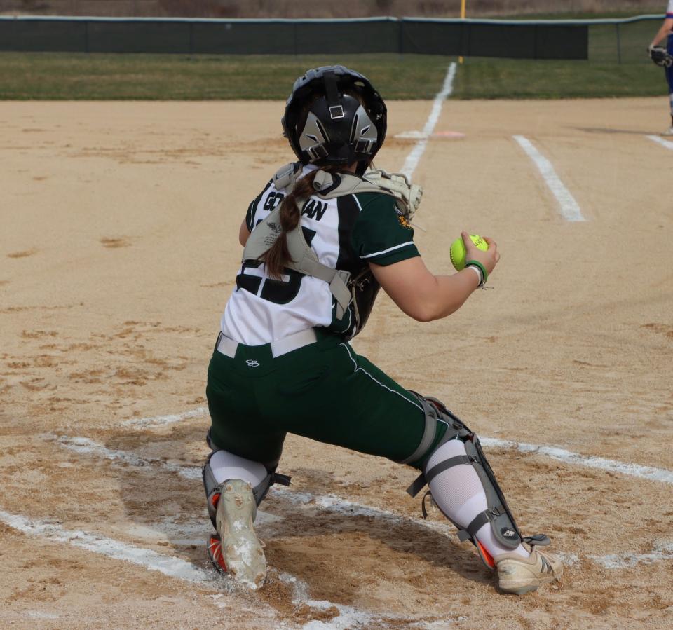 Dani Goodman gets set to show off another of her strengths, her arm, during a recent North Boone softball game.