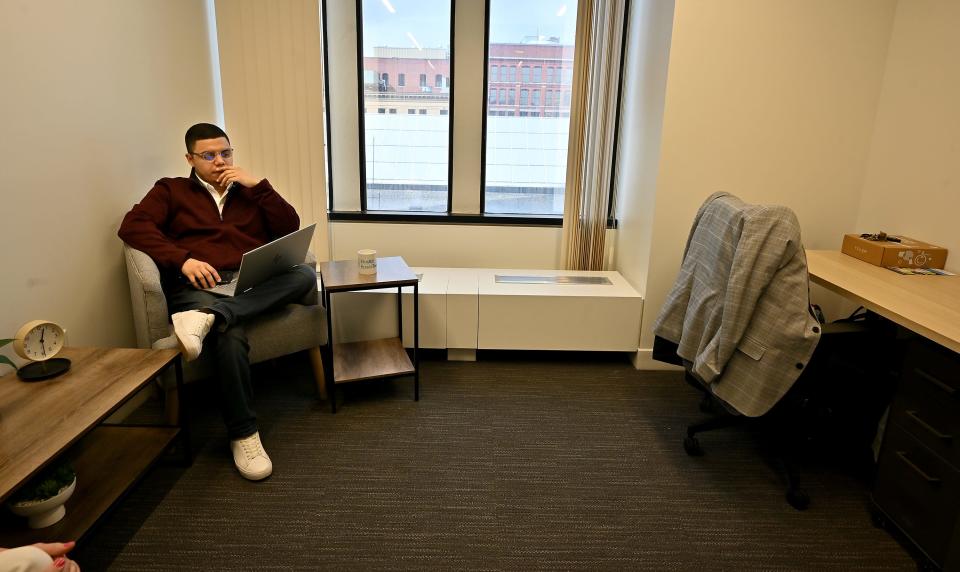 José Castro, executive director of EforAll Greater Worcester, works in his one-room office at Venture X Worcester on Front Street.