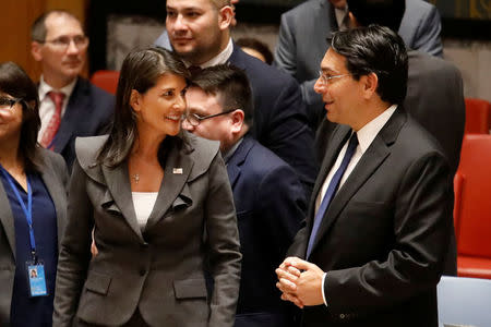 U.S. Ambassador to the United Nations Nikki Haley speaks with Israeli Ambassador to the United Nations Danny Danon before a Security Council vote on an Arab-backed resolution for protection of Palestinian civilians during a Security Council meeting at U.N. headquarters in Manhattan, New York, U.S., June 1, 2018. REUTERS/Shannon Stapleton